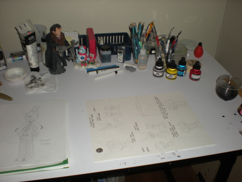 Workspace with lettered comics page